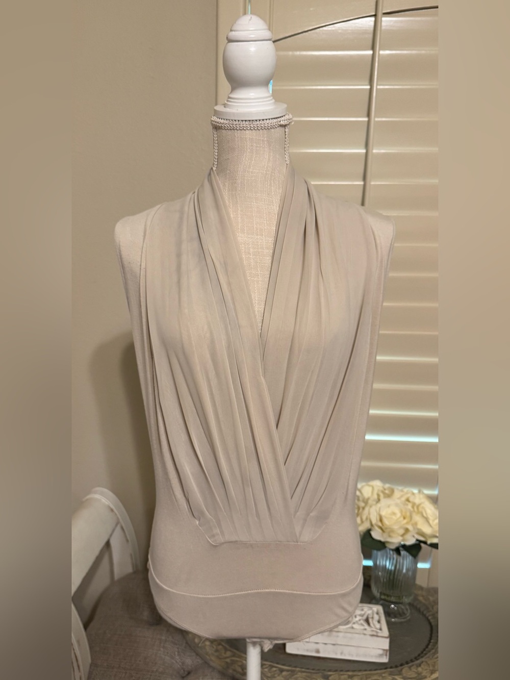 New York and Company Sleeveless Draped V-Neck Bodysuit in Light Beige
